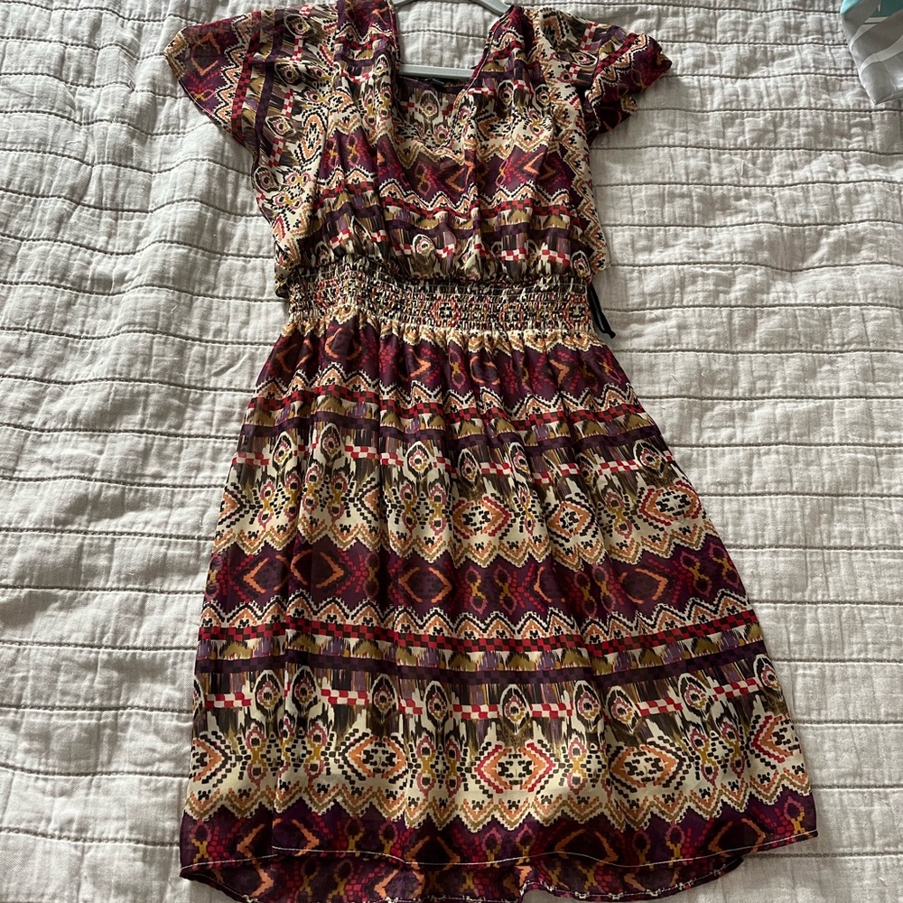 Cinch waist dress with patterns